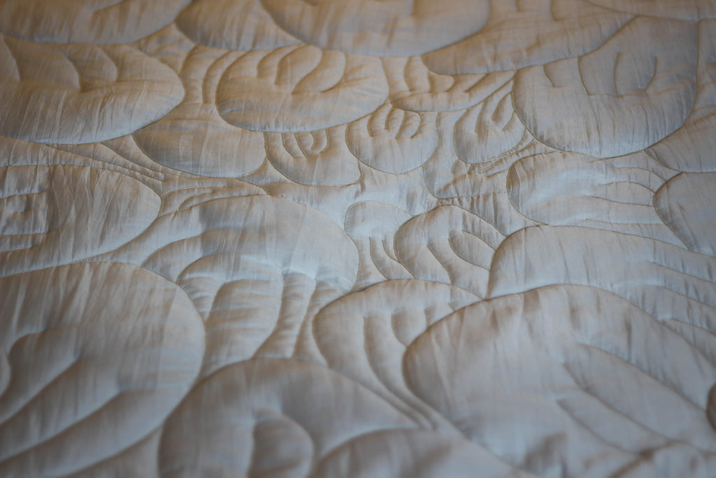 bud of chrysanthemum hand embroidered silk bedding silk blanket silk pillowcases Vietnamese artisans Luala Silk